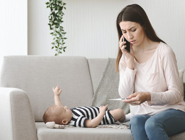 Worried mother calling to doctor asking for advice